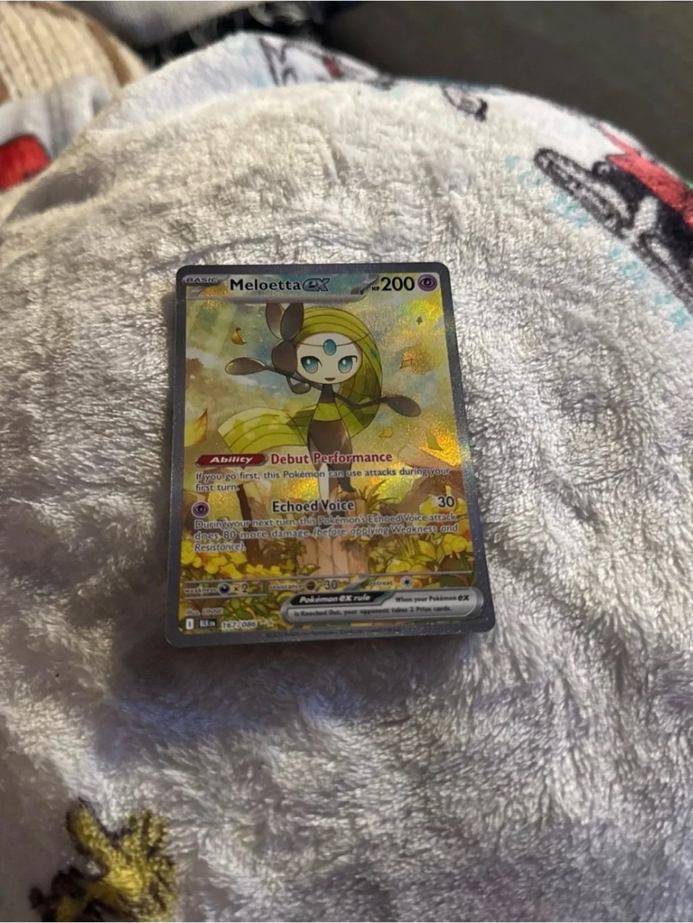 Pokemon Meloetta GX Trading Card - Yellow, Green, Black